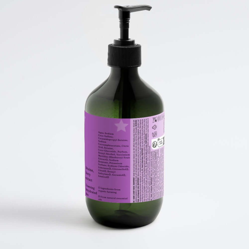 Bottle with a purple label on a white background LUXINA