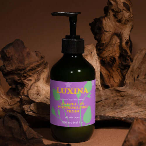 5% Urea + 2% Panthenol Body Cream in a stylish bottle against a natural wood background LUXINA